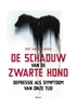Afbeelding van De schaduw van de zwarte hond
