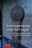 Afbeelding van Een regenjasje voor het aapje