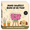 Afbeelding van Hond snuffelt rond in de tuin
