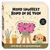 Afbeelding van Hond snuffelt rond in de tuin